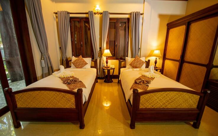 Imagen de la habitación del Hotel Treasure Laos. Foto 34