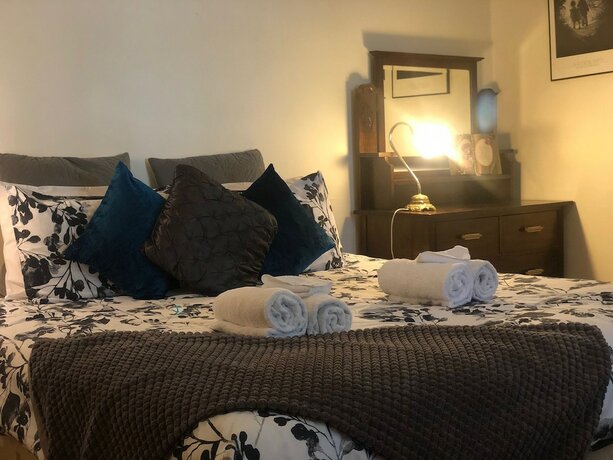 Imagen de la habitación del Hotel Treasured Memories Cottage. Foto 11