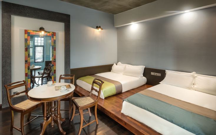 Imagen de la habitación del Hotel Treasures and Suites. Foto 9