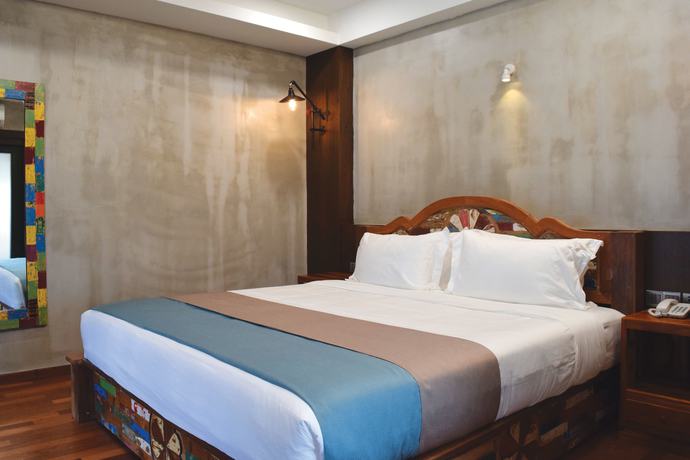 Imagen de la habitación del Hotel Treasures and Suites. Foto 10