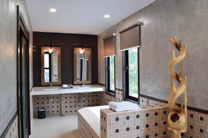 Imagen de la habitación del Hotel Treasures and Suites. Foto 15