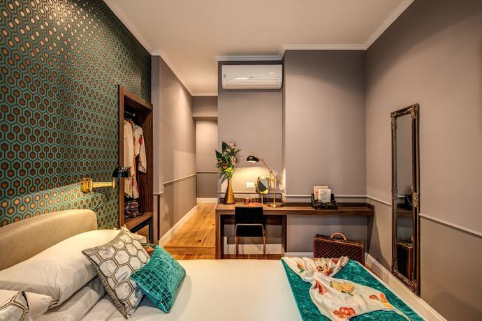 Imagen de la habitación del Hotel Tree Charme Parliament Boutique. Foto 7