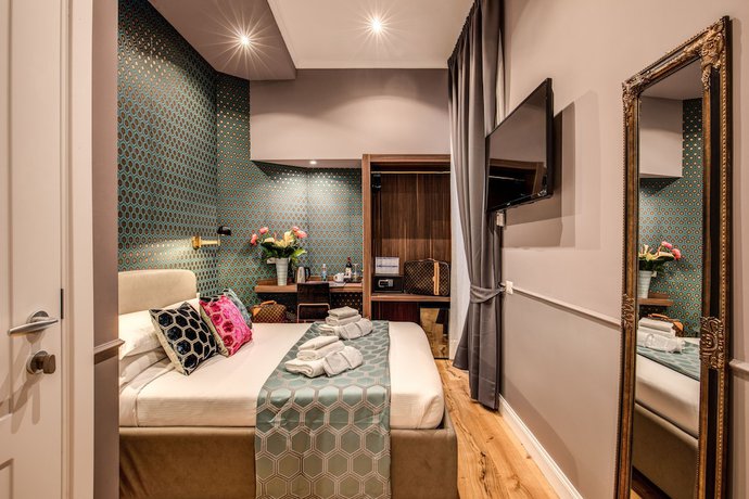 Imagen de la habitación del Hotel Tree Charme Parliament Boutique. Foto 9