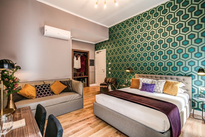 Imagen de la habitación del Hotel Tree Charme Parliament Boutique. Foto 13