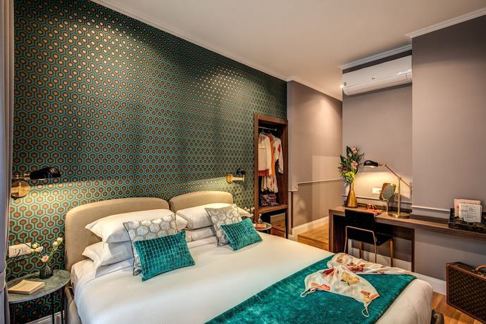 Imagen de la habitación del Hotel Tree Charme Parliament Boutique. Foto 14