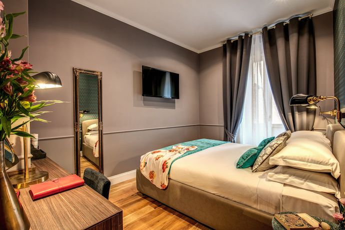 Imagen de la habitación del Hotel Tree Charme Parliament Boutique. Foto 15