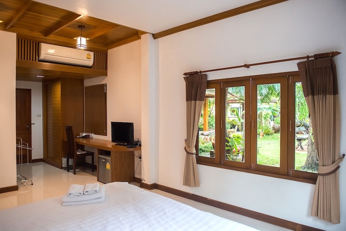 Imagen de la habitación del Hotel Tree Home Plus Home Stay. Foto 5