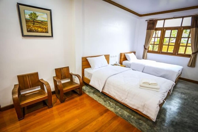 Imagen de la habitación del Hotel Tree Home Plus Home Stay. Foto 10