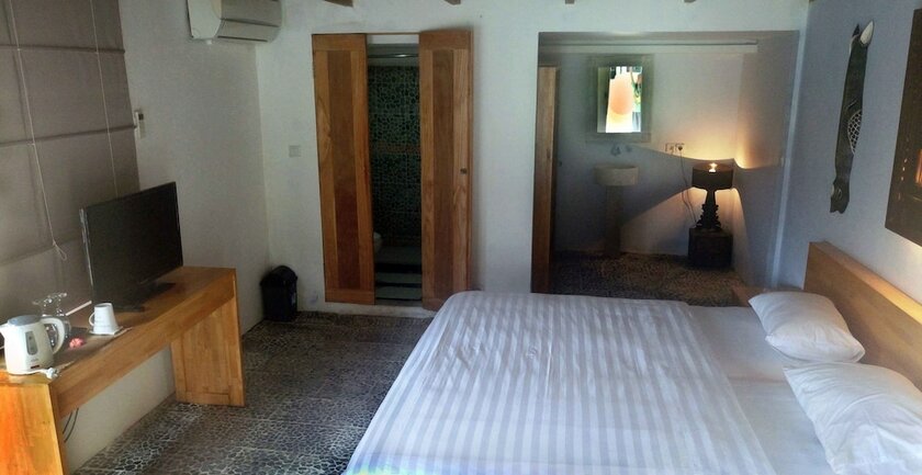 Imagen de la habitación del Hotel Tree House Villa Bali. Foto 5