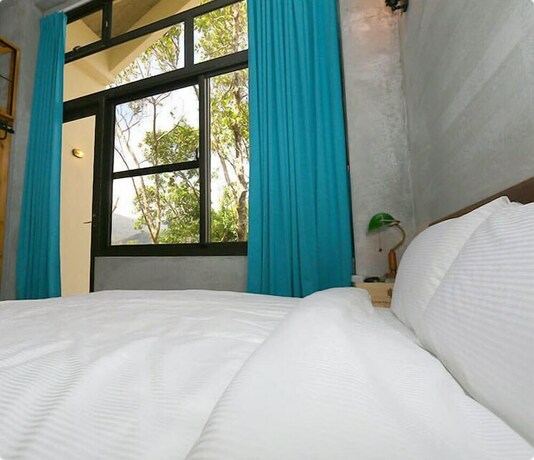 Imagen de la habitación del Hotel Tree Inn. Foto 10