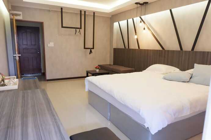 Imagen de la habitación del Hotel Tree Place. Foto 18