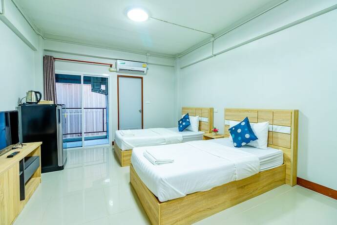 Imagen de la habitación del Hotel Tree Place. Foto 21