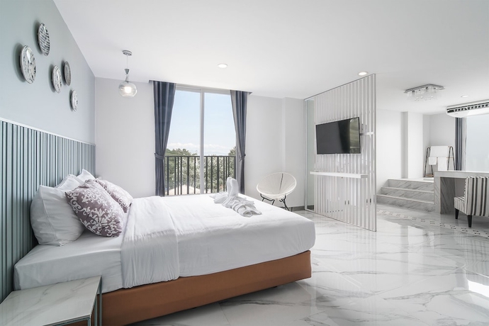 Imagen de la habitación del Hotel Tree Tara. Foto 7