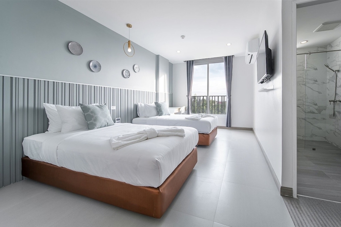 Imagen de la habitación del Hotel Tree Tara. Foto 8