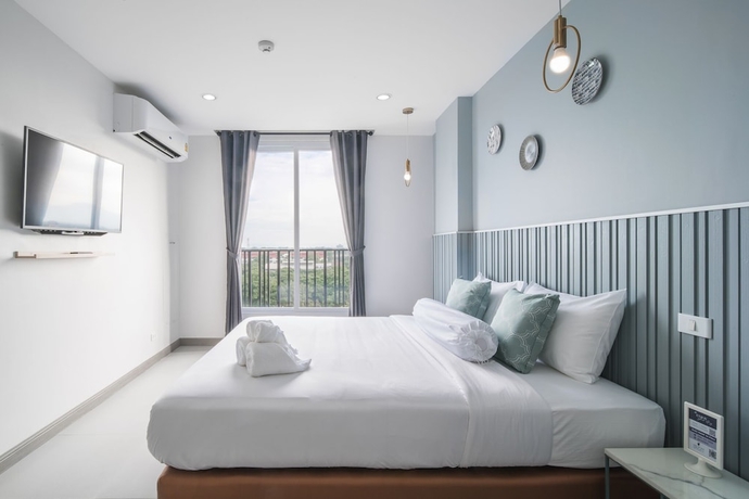 Imagen de la habitación del Hotel Tree Tara. Foto 10