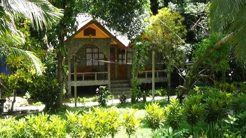 Imagen de la habitación del Hotel Tree Tops River Huts. Foto 16