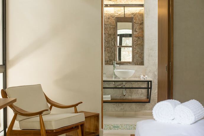 Imagen de la habitación del Hotel TreeHouse Boutique. Foto 19