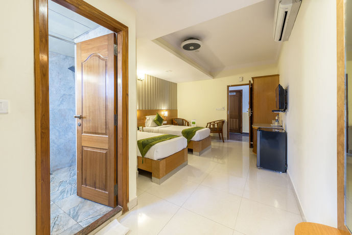 Imagen de la habitación del Hotel Treebo Akshaya Lalbagh Inn. Foto 3