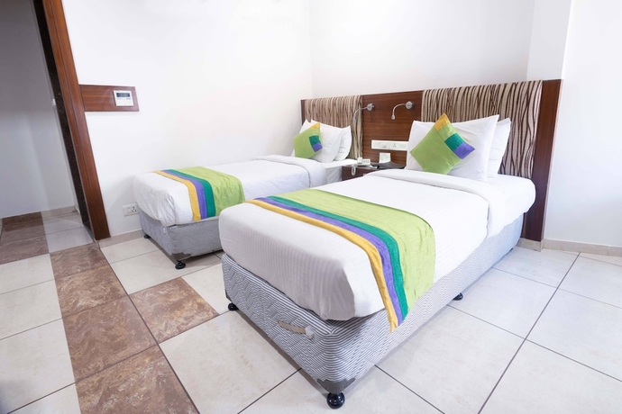 Imagen de la habitación del Hotel Treebo Ambassador. Foto 3