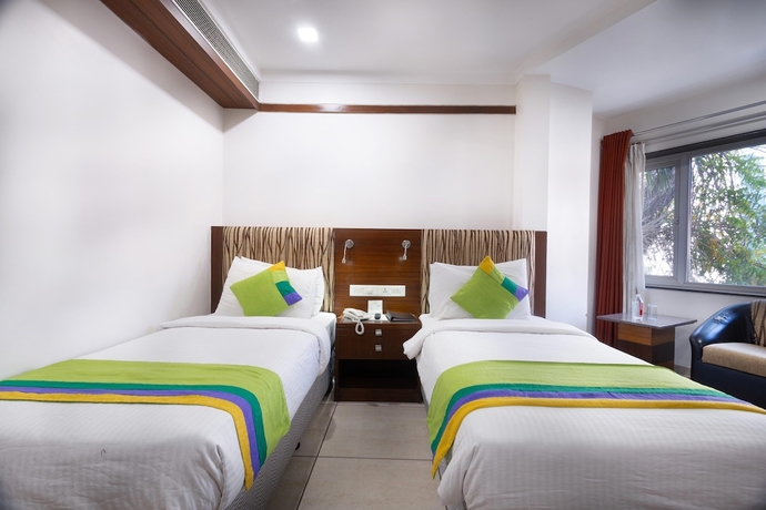 Imagen de la habitación del Hotel Treebo Ambassador. Foto 4