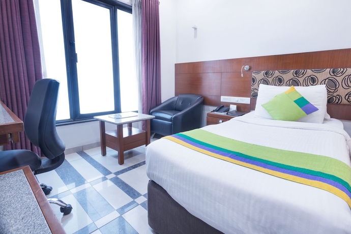 Imagen de la habitación del Hotel Treebo Ambassador. Foto 5