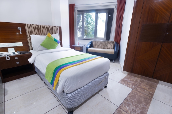 Imagen de la habitación del Hotel Treebo Ambassador. Foto 9