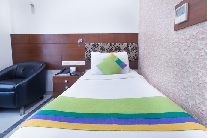 Imagen de la habitación del Hotel Treebo Ambassador. Foto 11