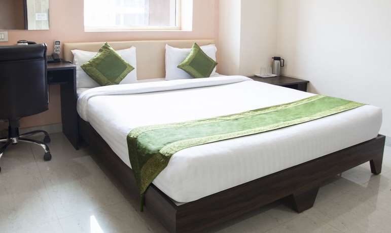 Imagen de la habitación del Hotel Treebo Atithi Inn. Foto 2