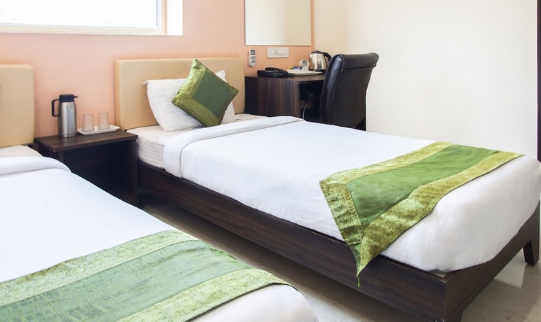 Imagen de la habitación del Hotel Treebo Atithi Inn. Foto 5