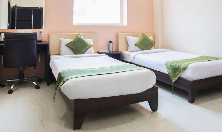 Imagen de la habitación del Hotel Treebo Atithi Inn. Foto 10