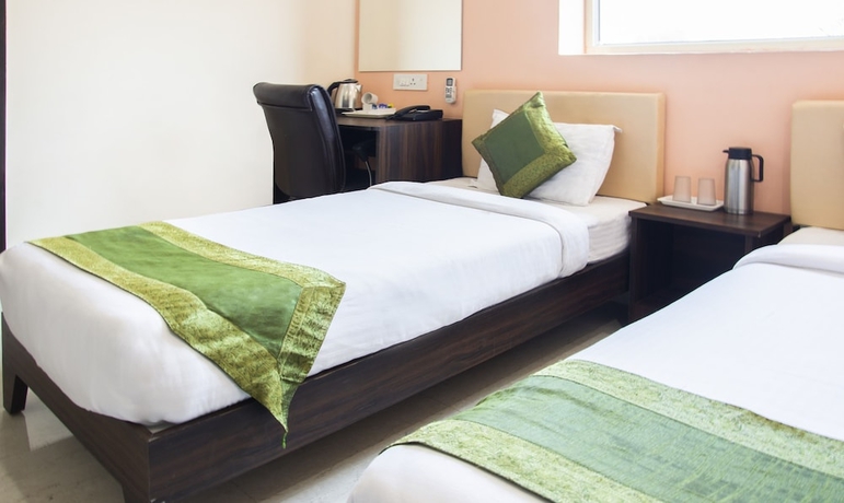 Imagen de la habitación del Hotel Treebo Atithi Inn. Foto 11