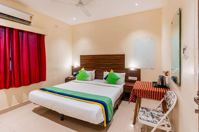 Imagen de la habitación del Hotel Treebo Express Inn. Foto 15