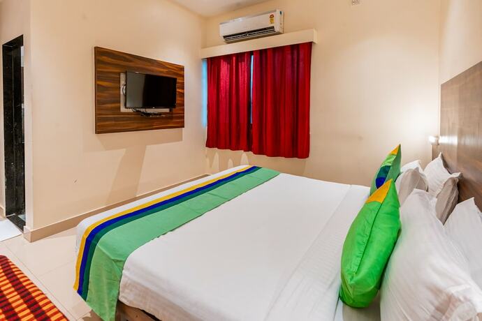 Imagen de la habitación del Hotel Treebo Express Inn. Foto 17