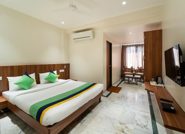 Imagen de la habitación del Hotel Treebo Kaveri. Foto 19
