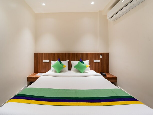 Imagen de la habitación del Hotel Treebo Kaveri. Foto 20