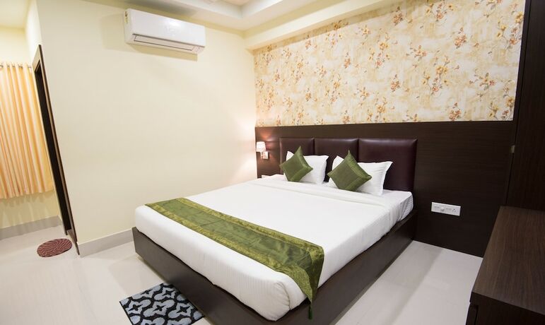 Imagen de la habitación del Hotel Treebo King's Court. Foto 18