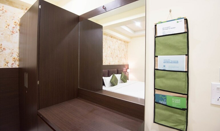 Imagen de la habitación del Hotel Treebo King's Court. Foto 19