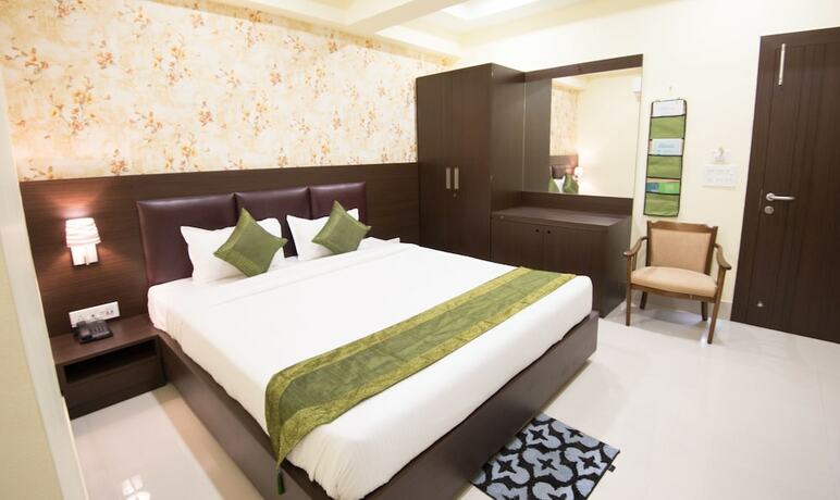 Imagen de la habitación del Hotel Treebo King's Court. Foto 20