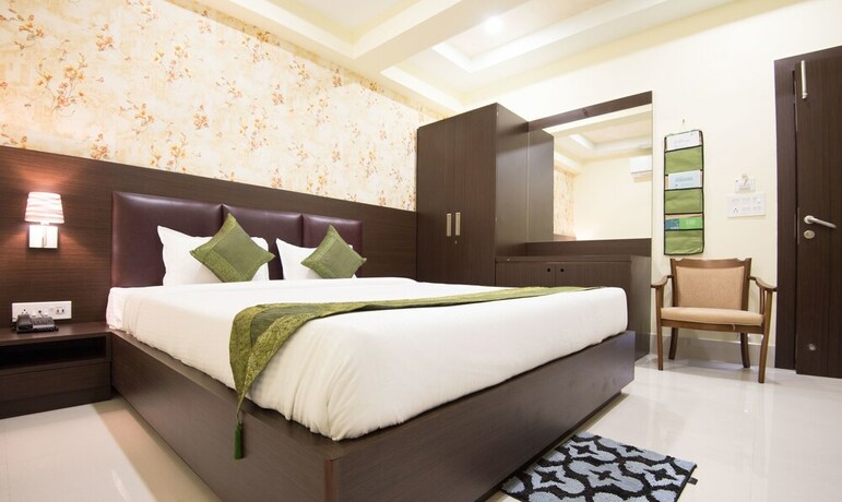 Imagen de la habitación del Hotel Treebo King's Court. Foto 21