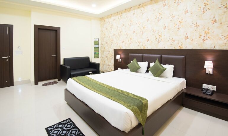 Imagen de la habitación del Hotel Treebo King's Court. Foto 22