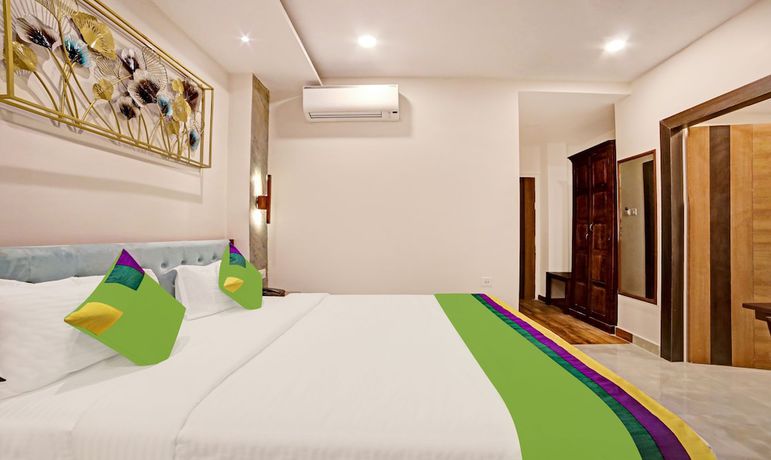 Imagen de la habitación del Hotel Treebo Lazystay Elite. Foto 1