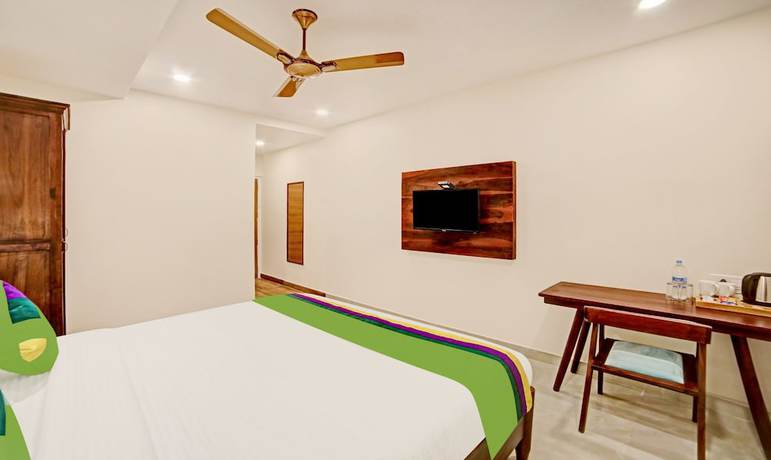Imagen de la habitación del Hotel Treebo Lazystay Elite. Foto 2