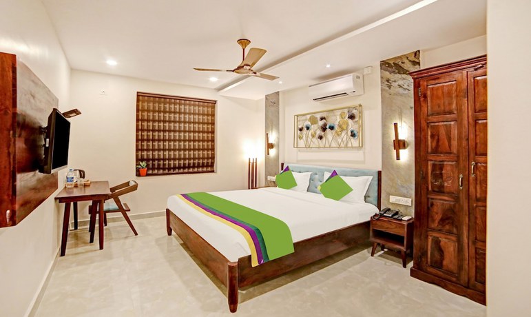 Imagen de la habitación del Hotel Treebo Lazystay Elite. Foto 7