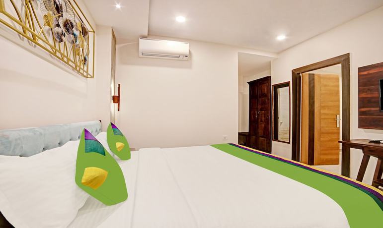 Imagen de la habitación del Hotel Treebo Lazystay Elite. Foto 8