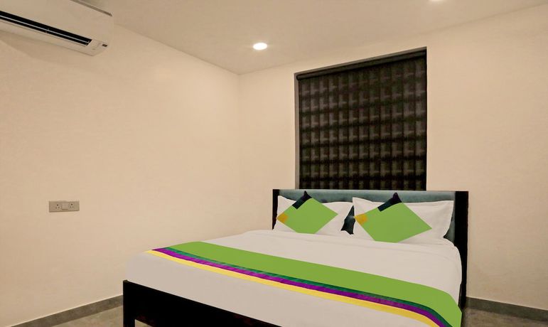 Imagen de la habitación del Hotel Treebo Lazystay Elite. Foto 12