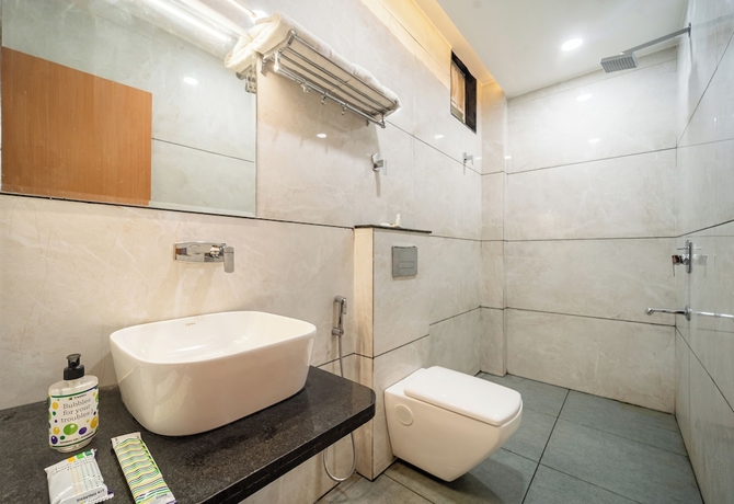 Imagen de la habitación del Hotel Treebo Lotus Blue. Foto 3