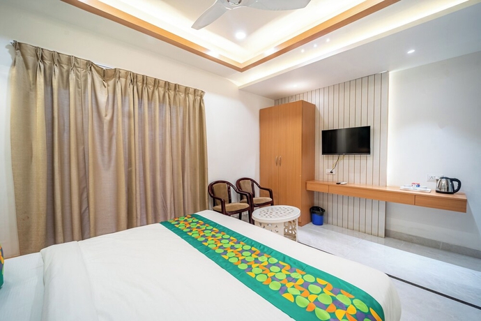 Imagen de la habitación del Hotel Treebo Lotus Blue. Foto 7