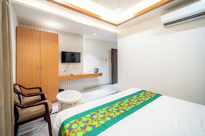 Imagen de la habitación del Hotel Treebo Lotus Blue. Foto 8
