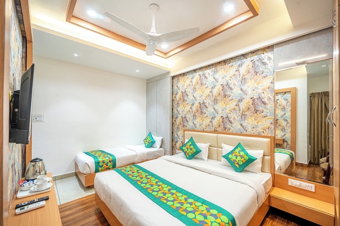 Imagen de la habitación del Hotel Treebo Lotus Blue. Foto 9