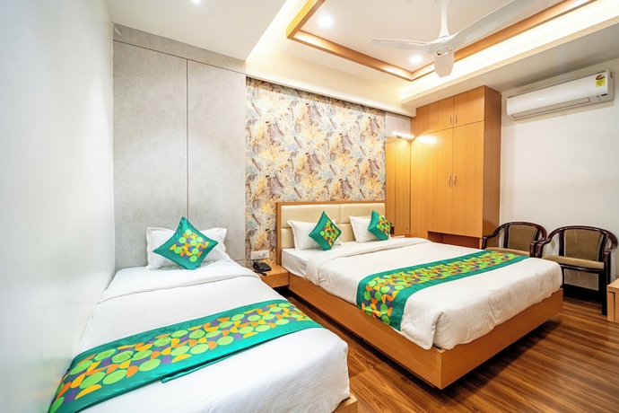 Imagen de la habitación del Hotel Treebo Lotus Blue. Foto 10